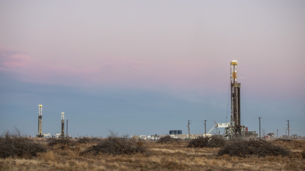 Oil drilling rigs operate near Midland, Texas, U.S., on Saturday, Jan. 29, 2022. Temperatures are forecast to plummet across the oil and natural gas producing areas of Texas later this week, threatening to impact production and the power grid. Photographer: Matthew Busch/Bloomberg