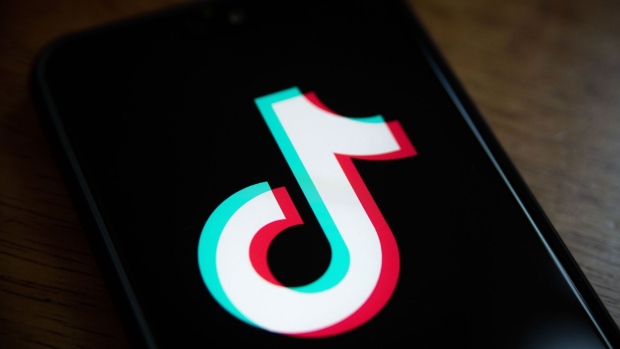 The logo for ByteDance Ltd.'s TikTok app is arranged for a photograph on a smartphone in Hong Kong, China, on Friday, Aug. 7, 2020. President Donald Trump signed a pair of executive orders prohibiting U.S. residents from doing business with the Chinese-owned TikTok and WeChat apps beginning 45 days from now, citing the national security risk of leaving Americans' personal data exposed.