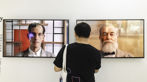 AI-generated videos at the Mobvoi booth at an AI conference in Shanghai. Photographer: Qilai Shen/Bloomberg