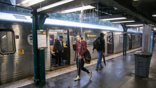 <p>A subway station during a rain storm in New York. </p>