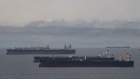 <p>Oil tankers in the bay near Puerto La Cruz refinery in Puerto La Cruz, Venezuela.</p>