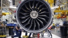 Employees assemble a LEAP jet engine at the General Electric Co. (GE) Aviation plant in Lafayette, Indiana, U.S., on Friday, July 19, 2019.
