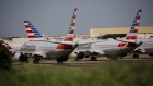 American Airlines Group Inc. Boeing Co. 737 Max planes sit parked outside of a maintenance hangar at Tulsa International Airport (TUL) in Tulsa, Oklahoma, U.S., on Tuesday, May 14, 2019. Three unions representing aviation safety inspectors said in a sharply worded report months before the Boeing's 737 Max was approved for use that the planemaker was given too much authority to oversee itself and that the new jet had safety flaws. Photographer: Patrick T. Fallon/Bloomberg