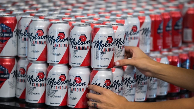 http://www.bnnbloomberg.ca/polopoly_fs/1.1515014!/fileimage/httpImage/image.jpg_gen/derivatives/landscape_620/a-worker-arranges-cans-of-molson-coors-brewing-co-canadian-beer.jpg