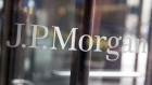 The JPMorgan Chase & Co. logo is displayed on a door at the former Bear Stearns Companies LLC. headquarters in New York, U.S., on Tuesday, April 14, 2009.