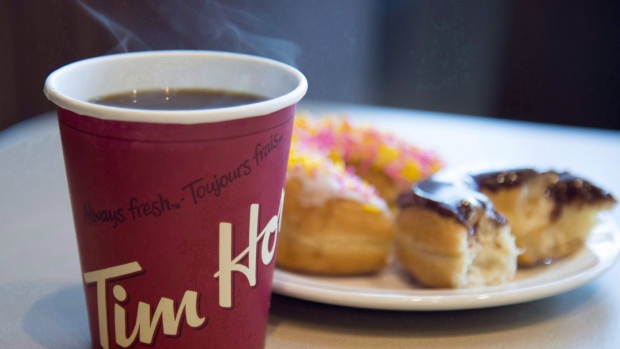 Brits try Tim Horton's Breakfast for the first time!! 