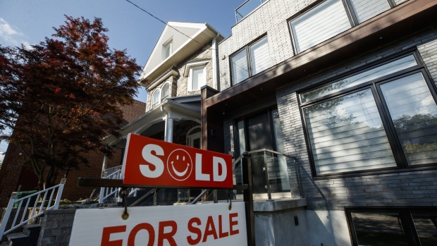 'Wait and see': Toronto, Vancouver home sales plummet as buyers hang around