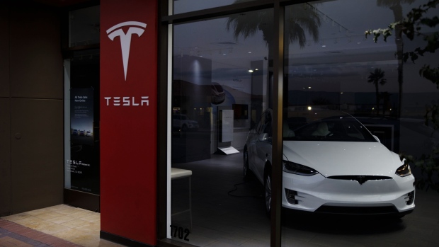 The Daily Chase: Tesla climbs in the premarket; Canfor restructures B.C operations