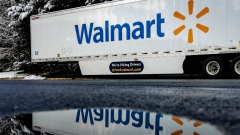 A Walmart trailer behind a store in Germantown, Maryland, US. Photographer: Samuel Corum/Bloomberg