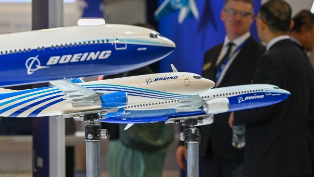 Miniature models of Boeing airplanes at the 2024 Singapore Airshow. Photographer: Roslan Rahman/AFP/Getty Images