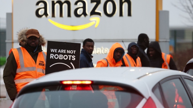 <p>Amazon workers on a picket line during a strike at the Amazon.com Inc. fulfilment centre in Coventry, UK, in Feb. 2023. </p>