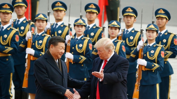 BEIJING, CHINA - NOVEMBER 9: Chinese President Xi Jinping greets U.S. President Donald Trump at a welcoming ceremony November 9, 2017 in Beijing, China. Trump is on a 10-day trip to Asia. (Photo by Thomas Peter-Pool/Getty Images)