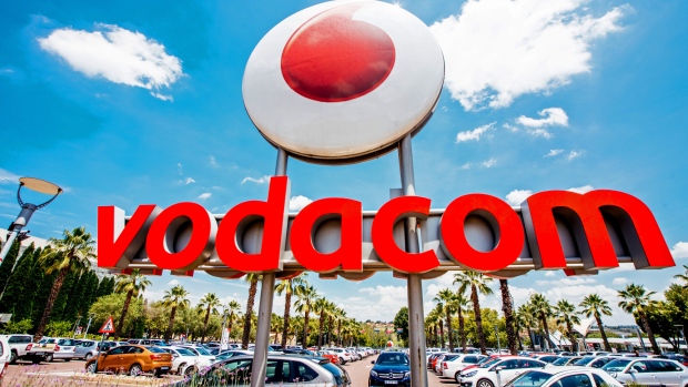 A Vodacom logo sits on display outside the Vodacom World mall, operated by Vodacom Group Ltd., in the Midrand district of Johannesburg, South Africa, on Thursday, Feb. 2, 2017. 