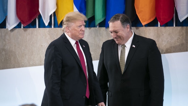 Mike Pompeo and Donald Trump. Photographer: Al Drago/Bloomberg