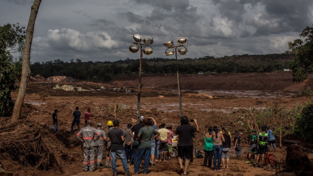 Residents survey damage after a Vale dam burst in Brumadinho, Brazil, on Jan. 26, 2019. Photographer: Victor Moriyama/Bloomberg