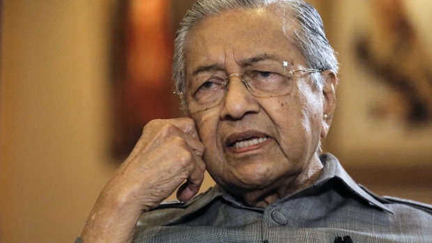 Mahathir Mohamad, Malaysia's former prime minister, speaks during a Bloomberg Television interview in Putrajaya, Malaysia, on Monday, March 16, 2020. Mahathir warned that the opposition coalition may lack the support needed to remove the current government, while criticizing his long-time rival Anwar Ibrahim for the collapse of his administration. Photographer: Joshua Paul/Bloomberg