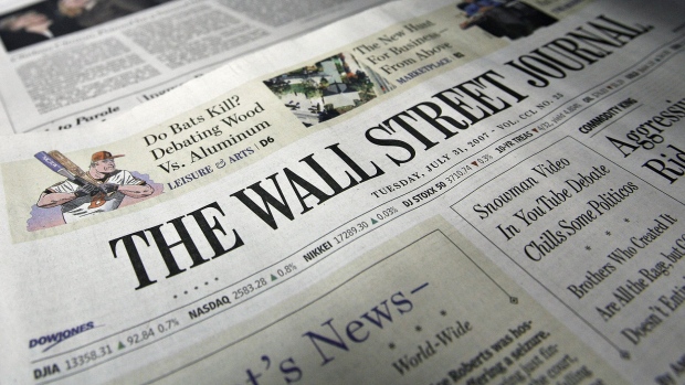 Copies of the Tuesday, July 31, 2007 edition of The Wall Street Journal sit on display in a news stand in New York.
