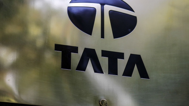 Signage for Tata Consultancy Services Ltd. is displayed outside the company's headquarters in Mumbai, India, on Saturday, Nov. 5, 2016. Cyrus Mistry, the ousted chairman of India's biggest conglomerate, was replaced as Tata Sons chairman by his 78-year-old predecessor Ratan Tata at a board meeting on Oct. 24. Tata Sons said the conglomerate's board and Trustees of the Tata Trusts were concerned about a growing “trust deficit” with Mistry, which prompted the company to remove him. Photographer: Dhiraj Singh/Bloomberg