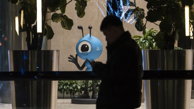 An employee walks through the campus of the Ant Group Co. headquarters in Hangzhou, China, on Wednesday, Jan. 20, 2021. Ant Co-Founder Jack Ma resurfaced for the first time since China’s government began clamping down on his business empire nearly three months ago, appearing in a live-streamed video that sent Ant affiliate Alibaba Group Holding Ltd.'s stock soaring but left plenty of unanswered questions about the billionaire’s fate. Photographer: Qilai Shen/Bloomberg