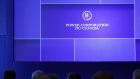 Signage is displayed on a screen during the Power Corp. of Canada (PCC) annual general meeting in Toronto