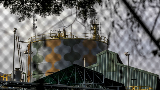 A storage tank stands at the Oil and Natural Gas Corporation Ltd. (ONGC) Uran plant in Uran, Maharashtra, India, on Monday, May 27, 2019. ONGC is scheduled to report earnings on May 30.