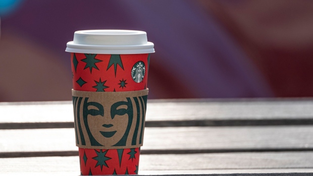 A Starbucks cup in San Francisco. Photographer: David Paul Morris/Bloomberg