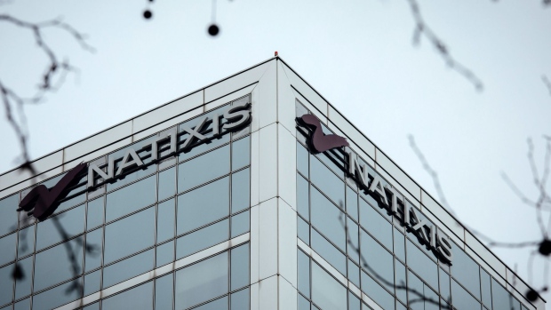 Signage for Natixis SA at an office building in Paris, France, on Thursday, Jan. 13, 2022. Former employee André M. Romain is seeking 10 million euros ($11 million) from Natixis for what he says is a finance-industry career ruined by the French banks management.
