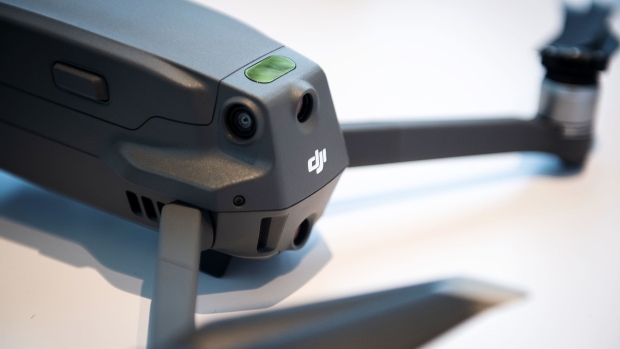The SZ DJI Technology Co. Mavic 2 Pro drone is displayed during an event in the Brooklyn Borough of New York, U.S., on Thursday, Aug. 23, 2018. DJI introduced two additions to the Mavic series: the Mavic 2 Pro, with an integrated Hasselblad camera, and the Mavic 2 Zoom, a foldable consumer drone with optical zoom capability.