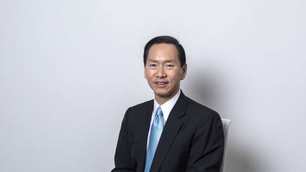 Bernard Chan, convener of the Executive Council of Hong Kong, poses for a photograph following a Bloomberg Television interview in Hong Kong, China, on Monday, June 17, 2019. Chan, a top government adviser, said Monday there was now "no chance" debate on a contentious extradition bill would resume.
