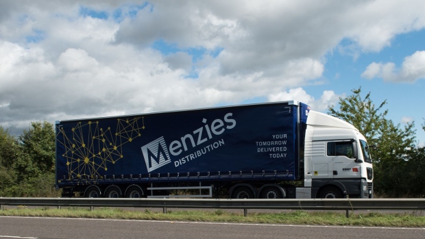 ESSEX, ENGLAND - SEPTEMBER 27: A Menzies Distribution HGV (Heavy Goods Vehicle) lorry delivering parcels drives along the A130 on September 27, 2021 in Essex, England. A shortage of lorry drivers in the UK has affected a broad range of supply chains. UK companies are currently struggling with a nationwide shortage of HGV (Heavy Goods Vehicles) drivers, According to the Road Haulage Association (RHA) there are an estimated 100,000 vacancies across the sector. (Photo by John Keeble/Getty Images)