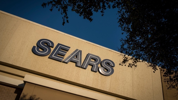 Signage is displayed outside of a Sears Holdings Corp. store in San Bruno, California, U.S., on Friday, Dec. 28, 2018. Sears got another chance at survival after Chairman Eddie Lampert put together a last-minute, last-ditch bid to buy the retailer out of bankruptcy. Photographer: David Paul Morris/Bloomberg