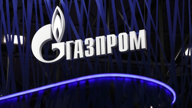 An illuminated logo sits on display outside the Gazprom PJSC pavilion ahead of the St. Petersburg International Economic Forum (SPIEF) in St. Petersburg. Photographer: Andrey Rudakov/Bloomberg