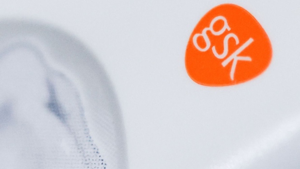The logo of GlaxoSmithkline Plc on the side of a tube of Sensodyne toothpaste arranged in Danbury, U.K., on Sunday, June 27, 2021. The U.K. company will list the consumer unit, which makes products such as Sensodyne toothpaste and Nicorette gum, in mid-2022 on the London Stock Exchange.