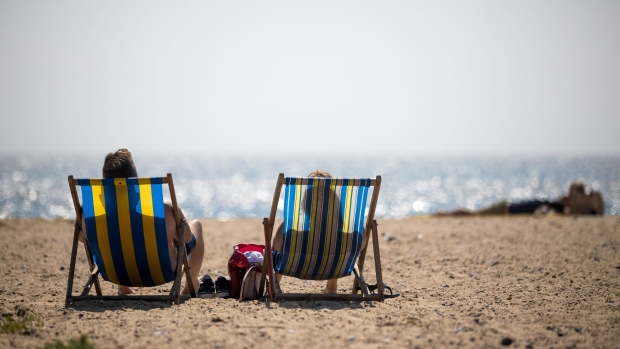 Holidaymakers in Great Yarmouth, U.K. Photographer: Jason Alden/Bloomberg