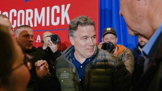 David McCormick, U.S. Republican Senate candidate, greets attendees during a campaign event in Coplay, Pennsylvania, U.S., on Tuesday, Jan. 25, 2022. McCormick, the former chief executive office of Bridgewater Associates, this month joined a crowded Republican primary field for the U.S. Senate in Pennsylvania saying he's running to fight "socialist policies" that he said have led to a surge in inflation.
