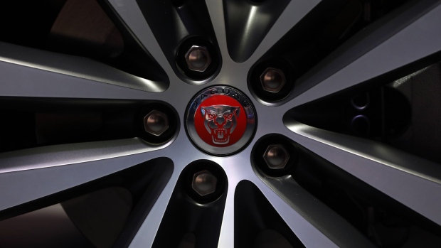 The Jaguar badge is seen on the wheel of an E-Pace sports utility vehicle (SUV), produced by Tata Motors Ltd.'s Jaguar Land Rover unit, during its unveiling in London, U.K., on Thursday, July 13, 2017. The E-Pace is expected to be the biggest and fastest-selling vehicle in the brand's history, representing a crucial step towards Jaguar's target of selling one million cars a year by 2020. Photographer: Chris Ratcliffe/Bloomberg
