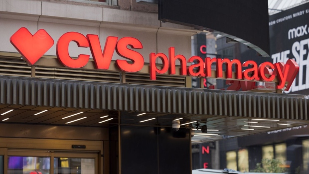 Signage outside a CVS Pharmacy store in New York, US, on Friday, Nov. 11, 2022. CVS Health Corp. edged up its 2022 profit forecast as its insurance unit helped the health-care company beat analysts’ expectations for third-quarter profit and the company reached a $5 billion settlement for litigation over its alleged involvement in the opioid crisis. Photographer: Nora Savosnick/Bloomberg