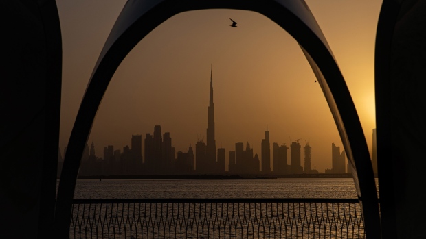 The Burj Khalifa skyscraper, center, stands above other skyscrapers on the city skyline in Dubai, United Arab Emirates, on Sunday, Sept. 6, 2020. Dubai made a rare foray into public bond markets, revealing along the way that its debt burden is now a lot smaller than estimated by analysts only months ago.