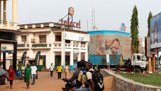 The Telecel Centrafrique SA logo sits atop a retail store in Bangui, Central African Republic, on Friday, March 15, 2019. A recent United Nations report pleaded for millions in funding for one of the world's most "neglected" crises following five years of fighting in the deeply impoverished Central African Republic. Photographer: Adrienne Surprenant/Bloomberg