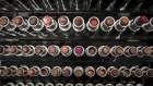 Lipsticks sit on display at a cosmetics store in a shopping mall in China. Photographer: Qilai Shen/Bloomberg