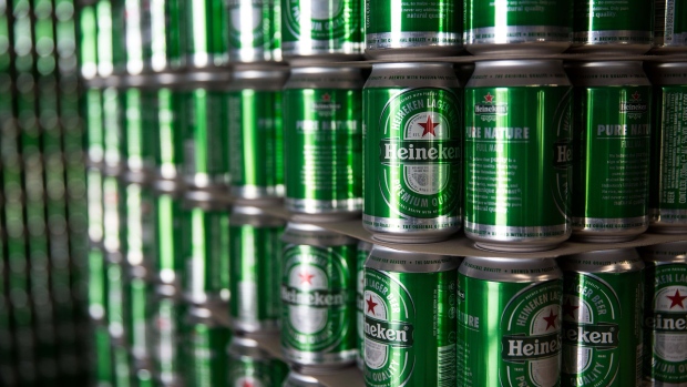 Cans of Heineken beer sit stacked in the bottling plant at the Heineken NV brewery in Yangon, Myanmar, on June 15, 2017. Heineken is seeking to exploit the potential of the southeast Asian nation where more than 80 percent of the adult population drinks beer. Beer sales in Myanmar rose 14 percent to $265 million between 2009 and 2013, and are forecast to reach $675 million by 2018, according to Euromonitor.