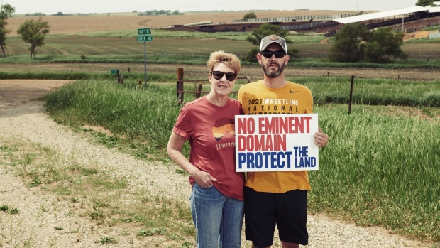 Vicki Hulse and her son, Bill Hulse, oppose a proposed carbon dioxide pipeline near their home in Moville, Iowa. 