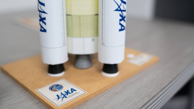 A paper model of the Japan Aerospace Exploration Agency's H3 rocket on display at Tsukuba Space Center in Ibaraki Prefecture, Japan. Photographer: Nicholas Takahashi/Bloomberg
