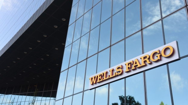 Wells Fargo & Co. signage is displayed on the exterior of a bank branch in Dallas, Texas, U.S., on Monday, July 10, 2017. Wells Fargo & Co. is scheduled to release earnings figures on July 14.