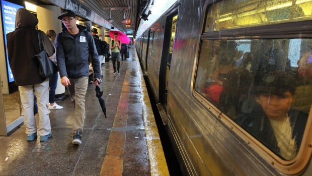 NEW YORK, NEW YORK - SEPTEMBER 29: People stand around at the Church Avenue subway station as subway service is stopped amid heavy rain on September 29, 2023 in the Flatbush neighborhood of Brooklyn borough New York City. Flash flooding is expected in the counties of Nassau, Queens and Kings, which includes Brooklyn, according to the state’s National Weather Service office as remnants of Tropical Storm Ophelia reaches the Northeast. (Photo by Michael M. Santiago/Getty Images)
