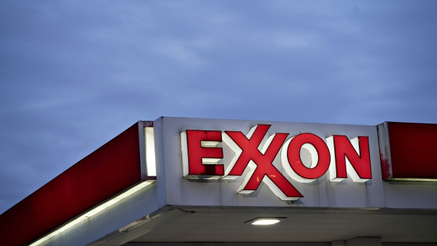 Signage is displayed at an Exxon Mobil Corp. gas station in Falls Church, Virginia, U.S., on Tuesday, April 28, 2020.  Photographer: Andrew Harrer/Bloomberg