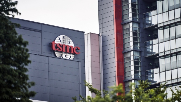 The Taiwan Semiconductor Manufacturing Co. logo atop a building at the Hsinchu Science Park in Hsinchu, Taiwan, on Tuesday, Oct. 17, 2023. TSMC is scheduled to release earnings results on Oct. 19. Photographer: An Rong Xu/Bloomberg