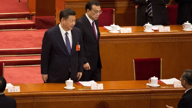 Xi Jinping and Li Keqiang. Photographer: Giulia Marchi/Bloomberg