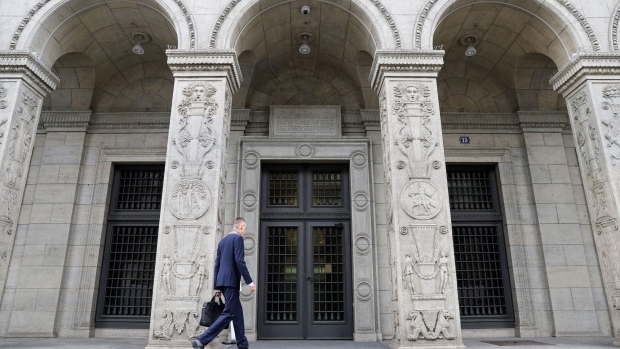 A visitor arrives at the Swiss National Bank (SNB) office in Zurich, Switzerland, on Thursday, Sept. 21, 2023. The Swiss National Bank paused its monetary tightening, defying expectations of another interest-rate hike to avoid adding constriction on a stalled economy.