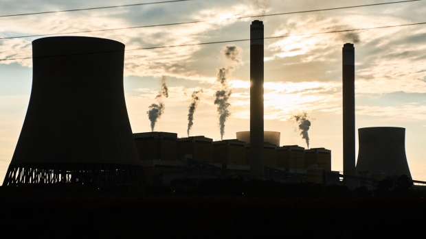 Cooling towers and chimneys at an Eskom coal-fired power station.